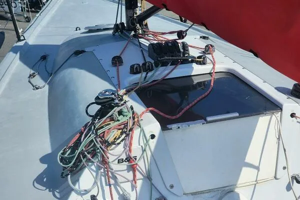 Slide: The Image of Close-up of 1996 Carroll Marine Farr 30 sailboat deck with rigging and ropes. - 6
