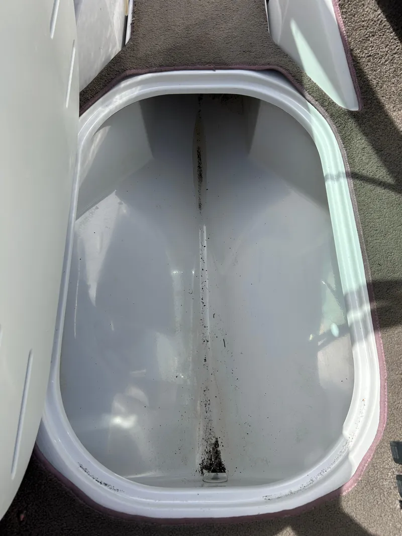 Slide: The Image of Storage compartment of 2007 Four Winns 183 Horizon F&S boat, open and empty. - 35