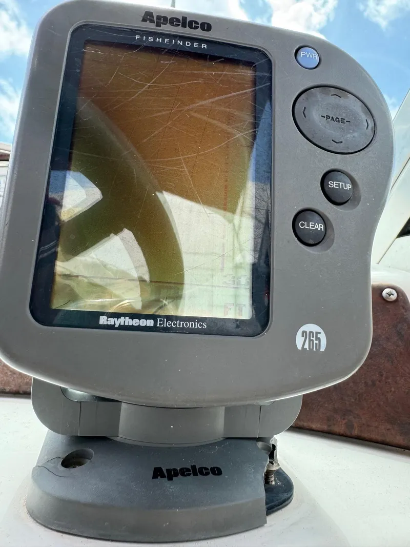 Slide: The Image of Fishfinder on 1999 Hurricane 232 FUN DECK boat by Raytheon Electronics. - 13
