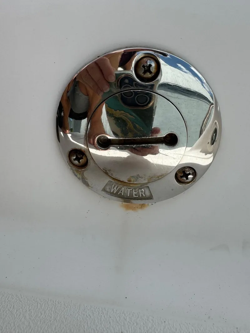 Slide: The Image of Close-up of water inlet on 1999 Hurricane 232 FUN DECK boat. - 19