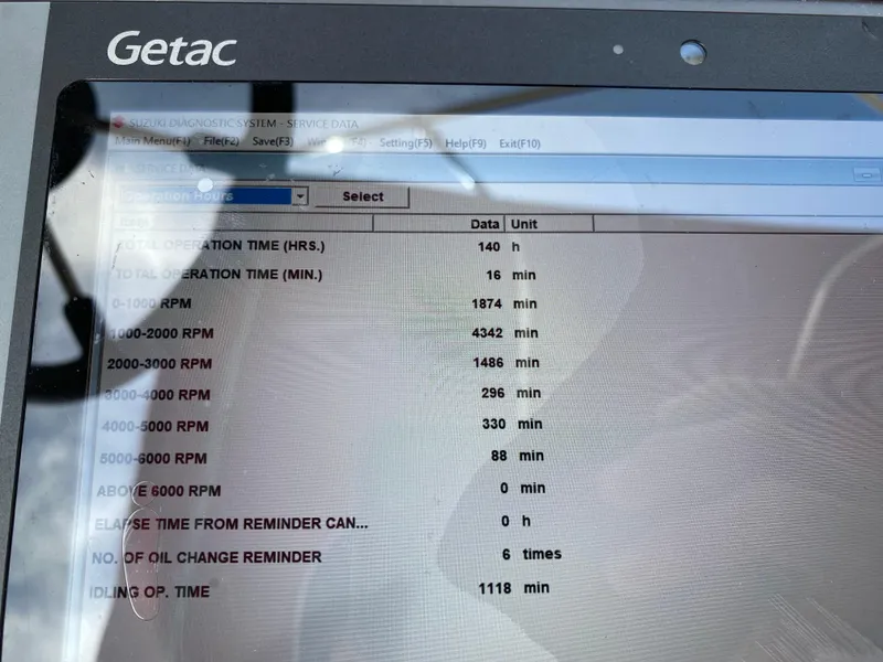Slide: The Image of Getac screen displaying engine operation data for 1999 Hurricane 232 FUN DECK boat. - 35