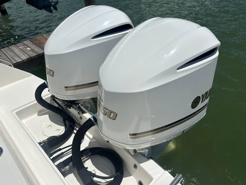 Slide: The Image of Twin Yamaha outboard engines on a 2013 Stamas 317 Tarpon boat. - 10