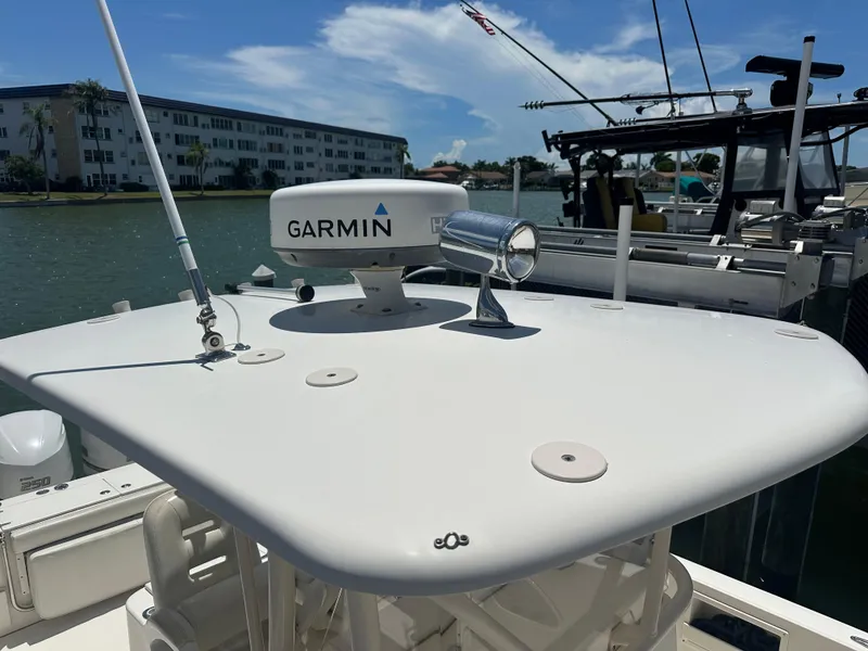 Slide: The Image of 2013 Stamas 317 Tarpon boat with Garmin radar on the water. - 14