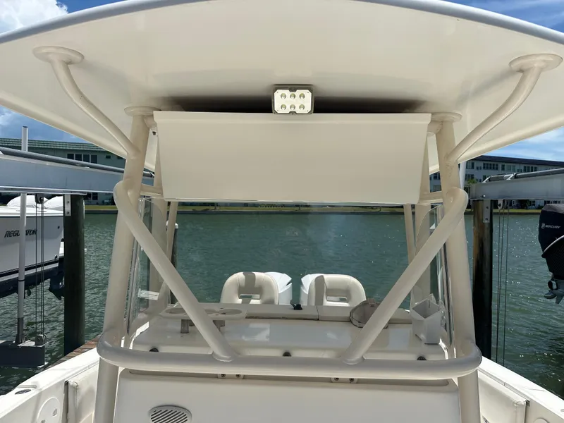 Slide: The Image of 2013 Stamas 317 Tarpon boat at dock, rear view of helm station. - 15