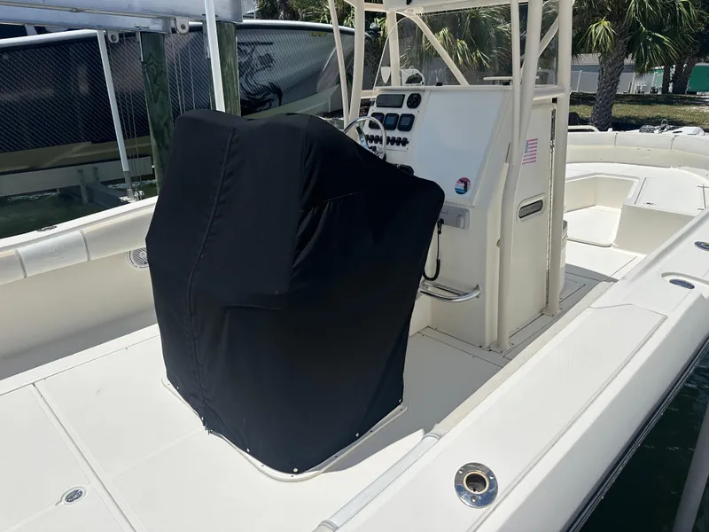 Slide: The Image of 2013 Stamas 317 Tarpon boat with covered console, docked in marina. - 36