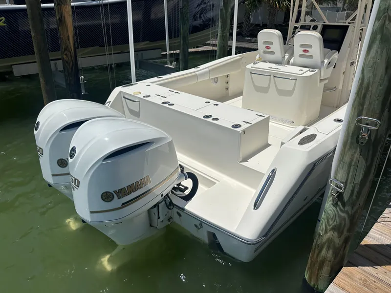 Slide: The Image of 2013 Stamas 317 Tarpon boat with twin Yamaha outboard engines docked. - 7