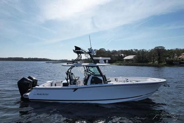 Slide: The Image of 2025 Blackfin 332cc boat displayed at Boat & Motor Superstores. - 1