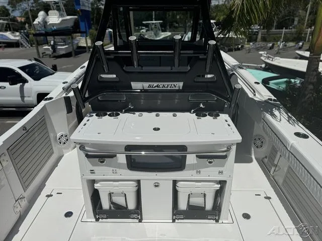 Slide: The Image of 2025 Blackfin 332cc boat with Garmin navigation system and rod holders. - 21