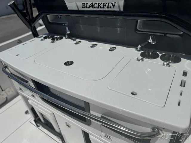 Slide: The Image of 2025 Blackfin 332cc boat cockpit with Garmin navigation system. - 22