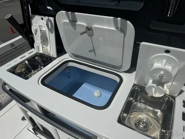Slide: The Image of 2025 Blackfin 332cc boat cockpit with Garmin navigation system. - 23