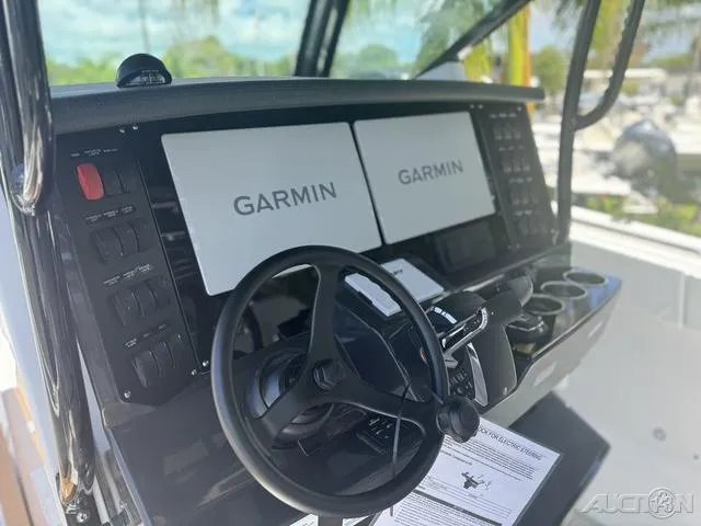 Slide: The Image of 2025 Blackfin 332cc boat anchor compartment with winch and chain. - 31