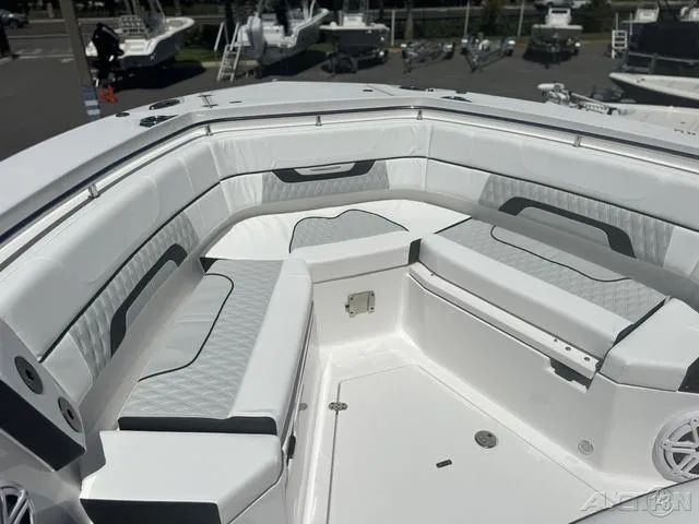 Slide: The Image of Close-up of 2025 Blackfin 332cc boat's overhead lighting and speaker system. - 36