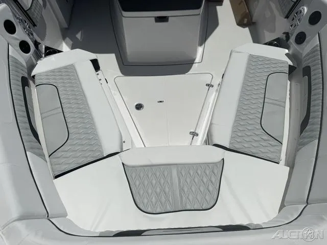 Slide: The Image of 2025 Blackfin 332cc boat interior with white seating and modern design. - 38