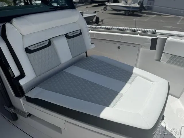 Slide: The Image of 2025 Blackfin 332cc boat interior, featuring sleek seating and modern design elements. - 39