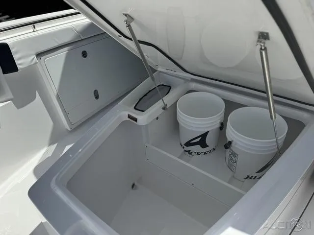 Slide: The Image of 2025 Blackfin 332cc boat with luxurious white seating and modern design. - 40
