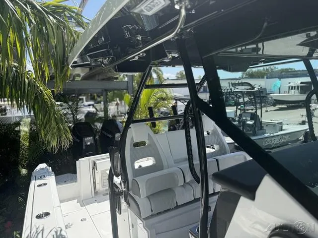 Slide: The Image of 2025 Blackfin 332cc boat interior bathroom with toilet and storage. - 44