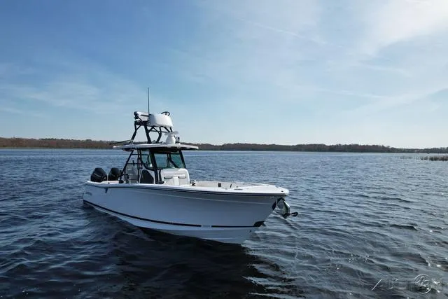 Slide: The Image of Close-up of a Mercury engine on a 2025 Blackfin 332cc boat. - 6