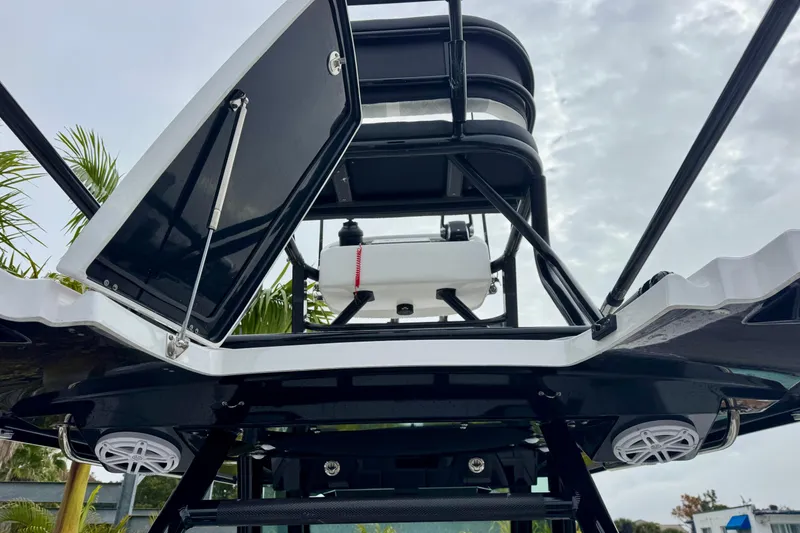 Slide: The Image of 2025 Blackfin 332 CC boat with open hatch and speakers, viewed from below. - 75