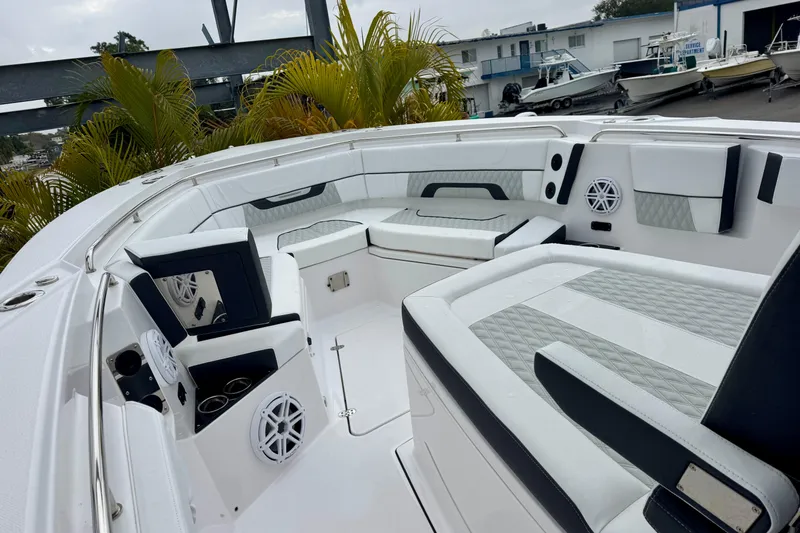 Slide: The Image of 2025 Blackfin 332 CC boat interior with luxurious seating and modern design. - 79