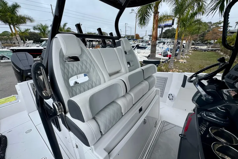 Slide: The Image of 2025 Blackfin 332 CC boat interior with luxurious seating and modern design. - 88