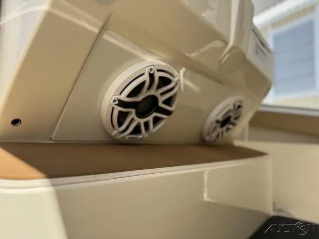 Slide: The Image of 2022 Scout 330 LXF boat speakers and seating area. - 45