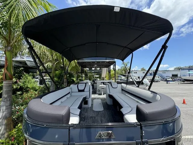Slide: The Image of 2024 Avalon Catalina Entertainer Funship 27 FT pontoon boat with spacious seating and canopy. - 20
