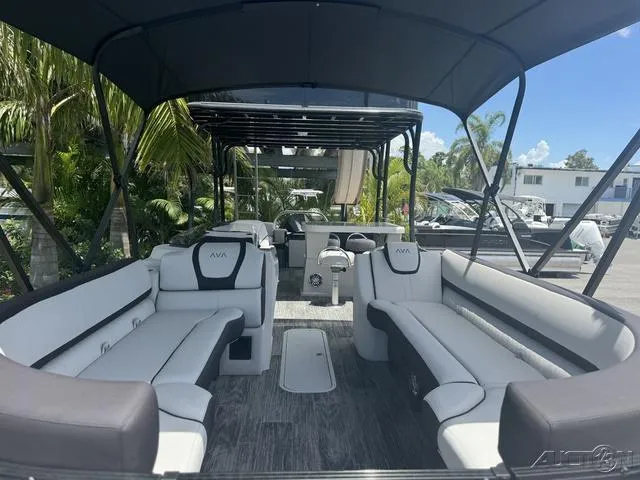 Slide: The Image of 2024 Avalon Catalina Entertainer Funship 27 FT interior with spacious seating and canopy. - 21