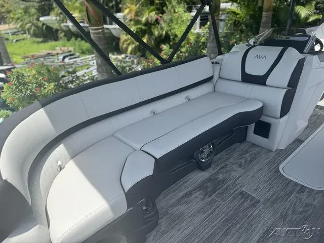 Slide: The Image of 2024 Avalon Catalina Entertainer Funship 27 FT interior seating area with modern design. - 22