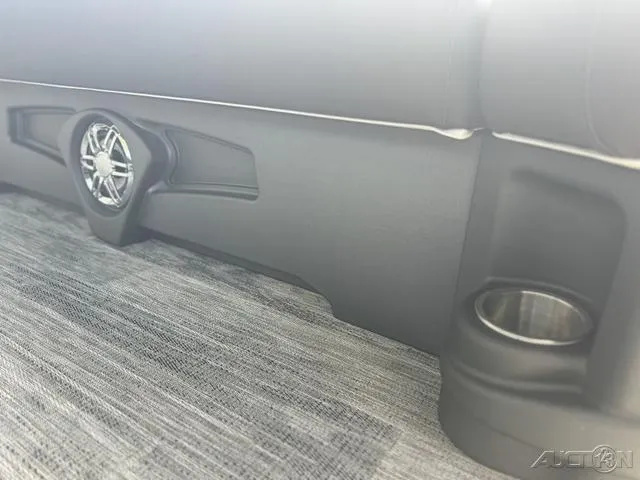 Slide: The Image of 2024 Avalon Catalina Entertainer Funship 27 FT interior speaker and cup holder. - 24