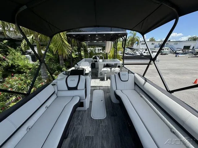 Slide: The Image of 2024 Avalon Catalina Entertainer Funship 27 FT interior with spacious seating and modern design. - 28