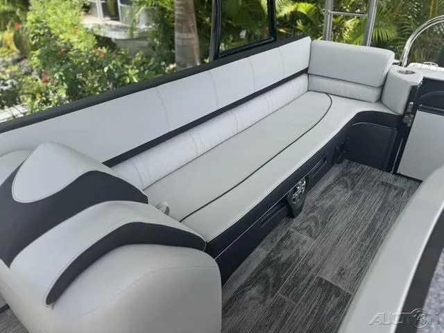 Slide: The Image of 2024 Avalon Catalina Entertainer Funship 27 FT interior seating area with modern design. - 42
