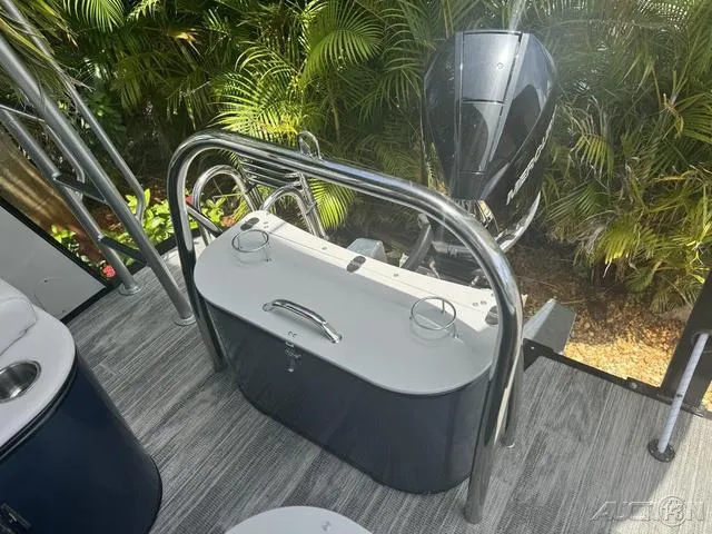 Slide: The Image of 2024 Avalon Catalina Entertainer Funship 27 FT rear deck with outboard motor. - 49