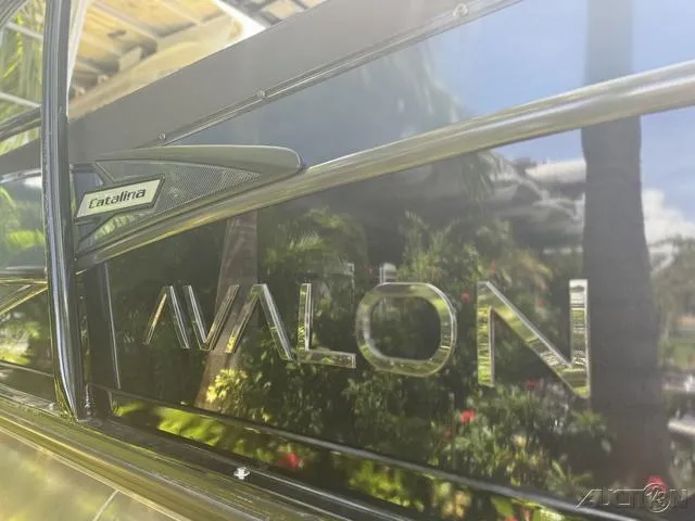 Slide: The Image of 2024 Avalon Catalina Entertainer Funship 27 FT boat exterior branding. - 9