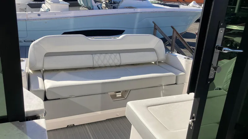 Slide: The Image of Luxurious interior seating of 2025 Regal 36 Grande Coupe boat. - 8