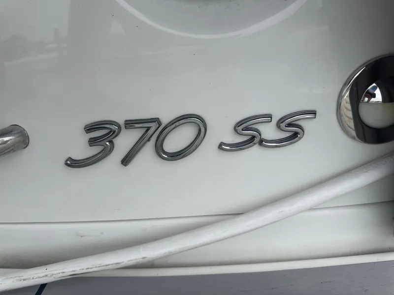 Slide: The Image of 2017 Formula 370 Super Sport boat emblem on white surface. - 11