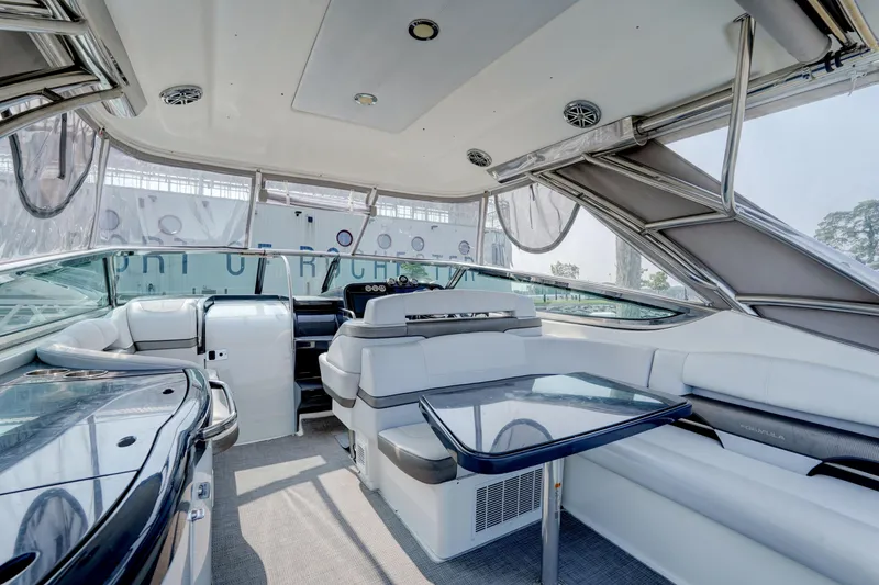 Slide: The Image of 2017 Formula 370 Super Sport yacht interior with luxurious seating and sleek design. - 21