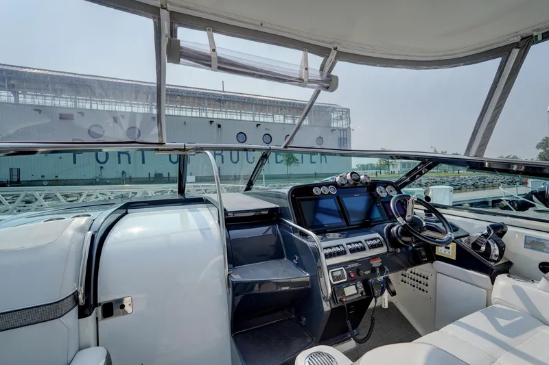 Slide: The Image of 2017 Formula 370 Super Sport yacht cockpit with modern navigation equipment. - 22