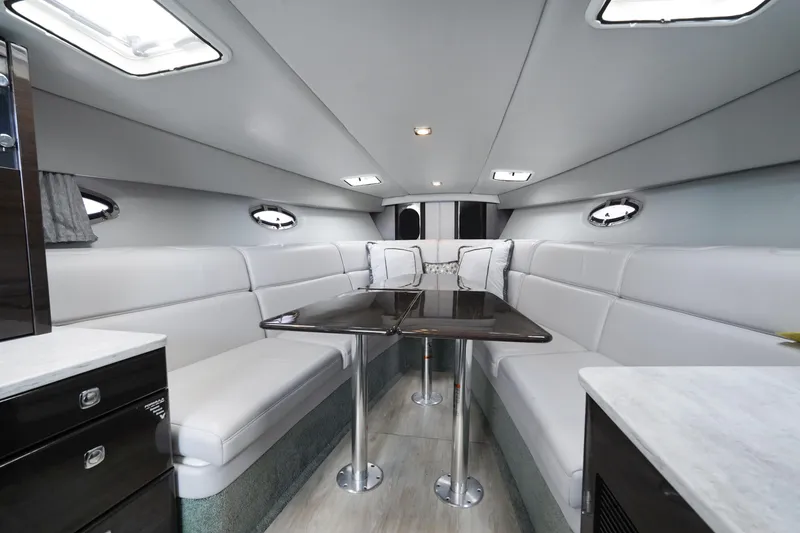 Slide: The Image of Luxurious interior of a 2017 Formula 370 Super Sport yacht with elegant seating and tables. - 32