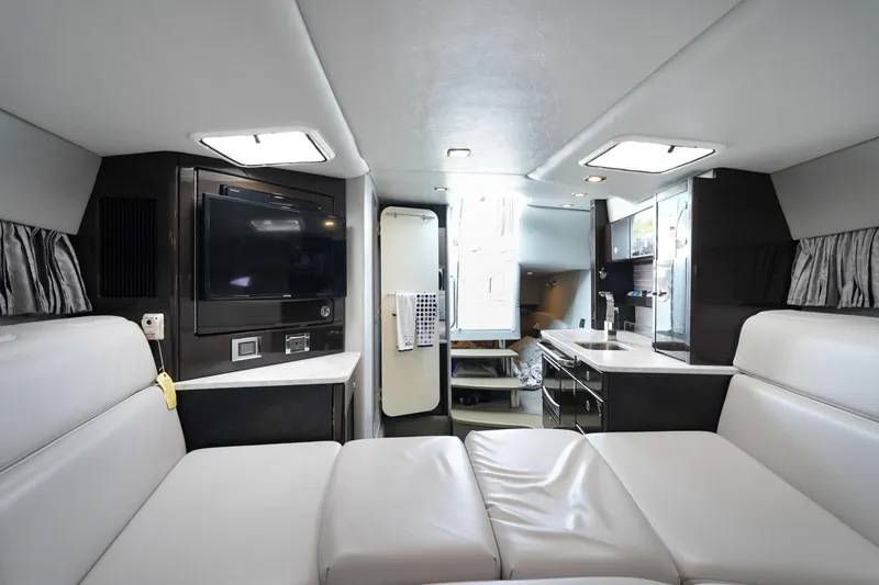 Slide: The Image of Interior of 2017 Formula 370 Super Sport yacht with modern seating and entertainment area. - 37