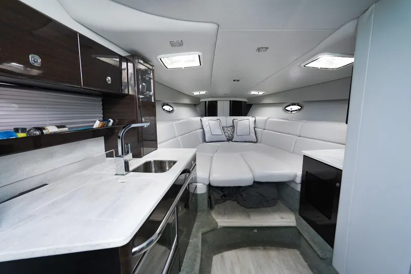 Slide: The Image of Luxurious interior of 2017 Formula 370 Super Sport yacht with modern kitchen and seating area. - 41