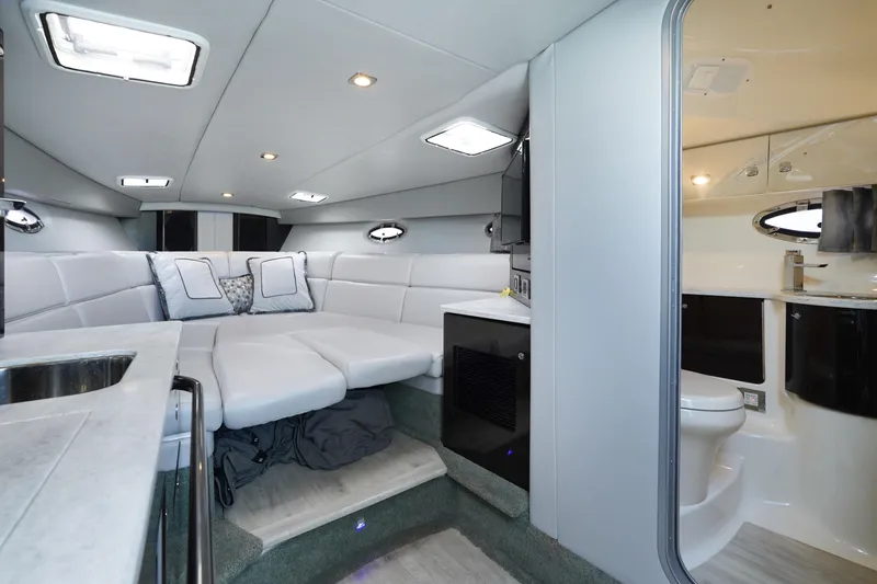 Slide: The Image of Interior of 2017 Formula 370 Super Sport boat with modern seating and compact bathroom. - 42