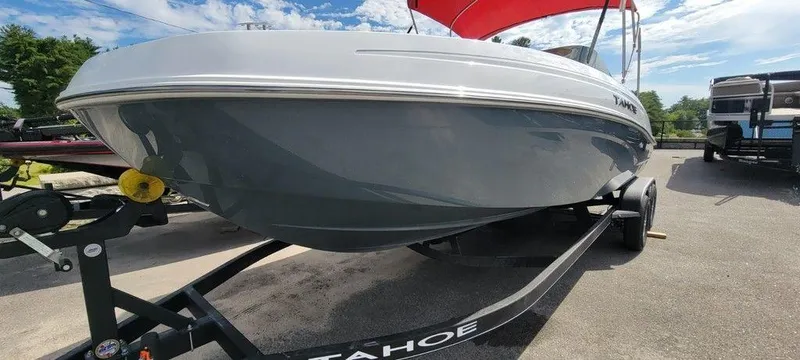 Slide: The Image of 2024 Tahoe T21 boat on trailer with red canopy. - 10