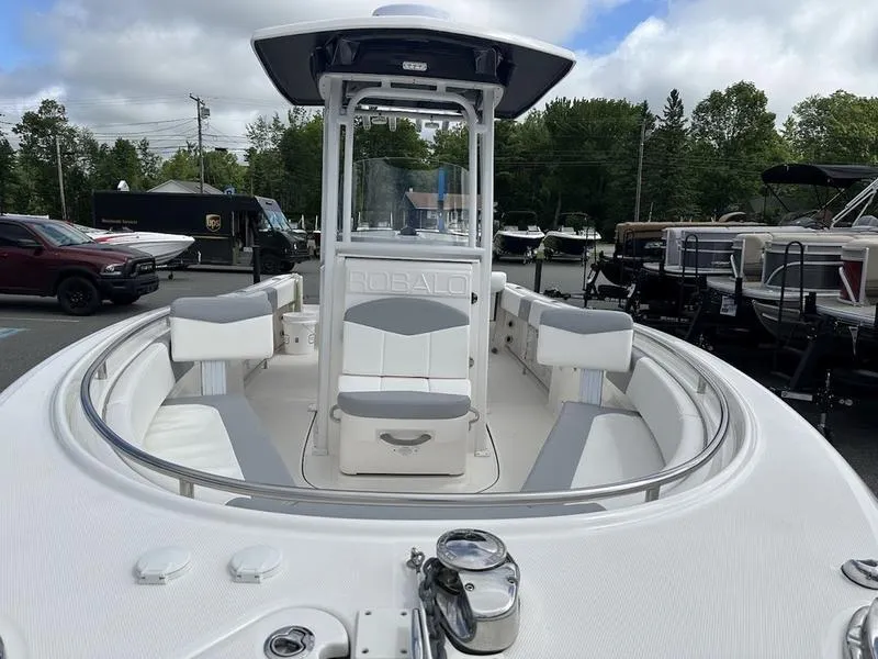 Slide: The Image of 2022 Robalo R242 boat with spacious seating and modern design. - 15