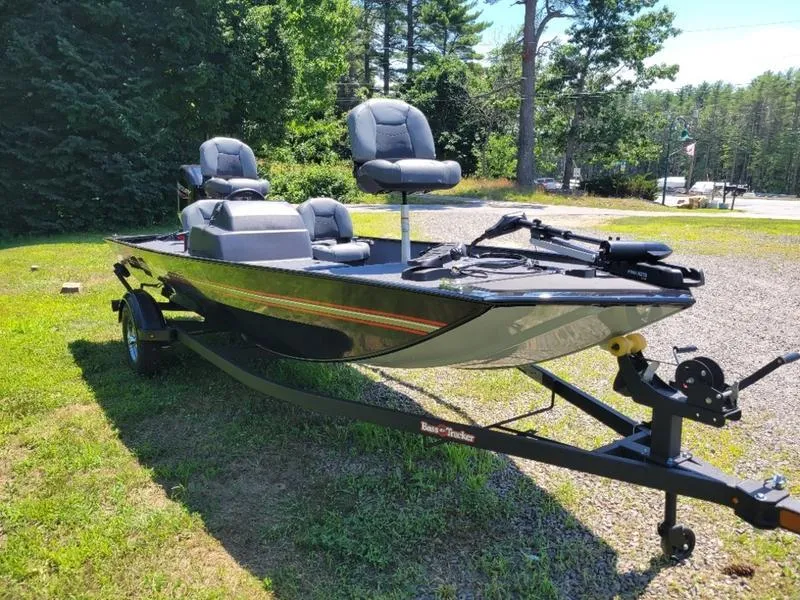 Slide: The Image of 2024 Tracker BT CLASSIC XL fishing boat on trailer in outdoor setting. - 5