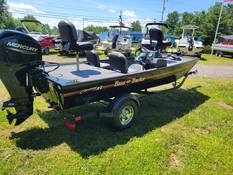 Slide: The Image of 2024 Tracker BT CLASSIC XL boat with Mercury engine on trailer. - 6