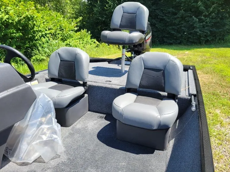 Slide: The Image of 2024 Tracker BT CLASSIC XL boat interior with three gray seats. - 7