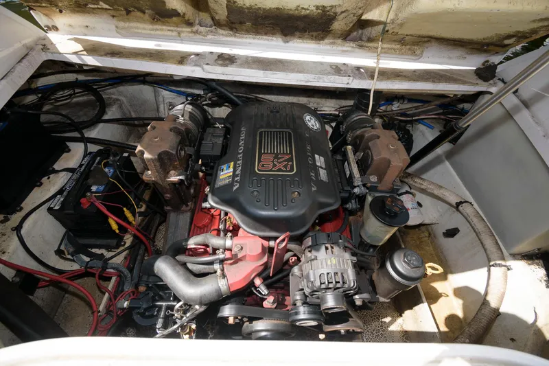 Slide: The Image of 2009 Four Winns 274 Funship engine compartment with visible components and wiring. - 10