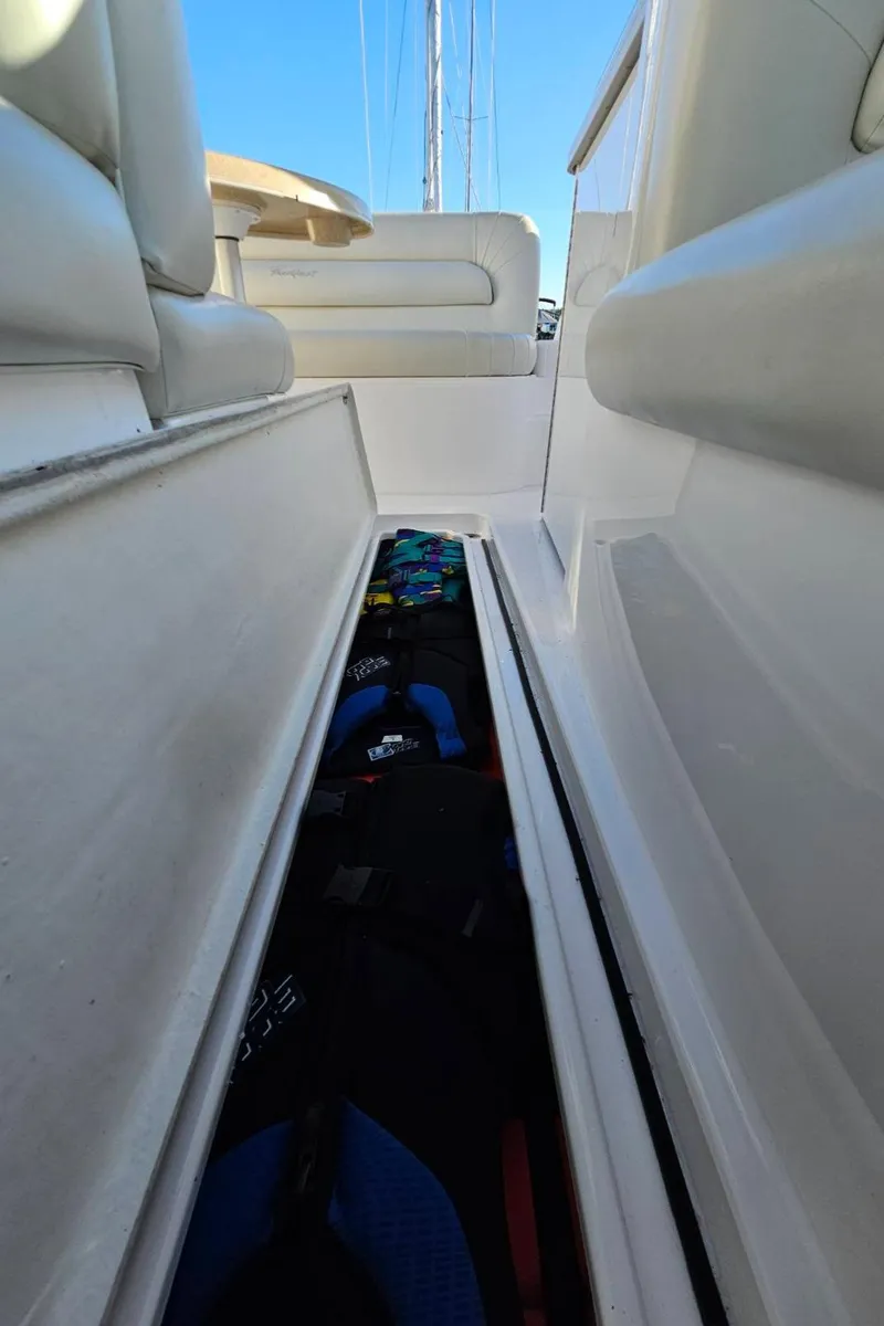 Slide: The Image of Storage compartment on a 2003 Powerquest 280 SC boat. - 19