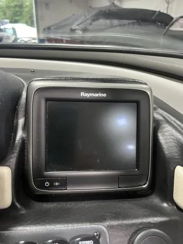 Slide: The Image of Raymarine display on 2020 Crownline 235 SS boat dashboard. - 9