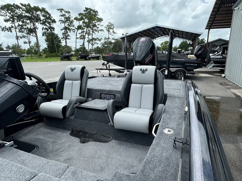 Slide: The Image of 2025 Phoenix 920 Elite 2 boat with dual seats and steering console. - 12